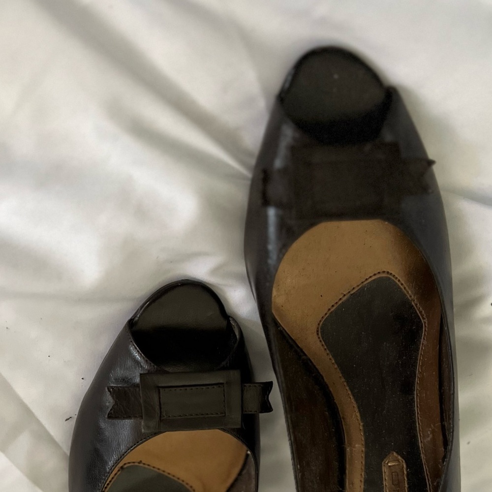 Size 8.5 low heel super comfy brown open toe sling backs.  ABC.